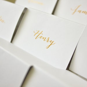 Gold Ink Calligraphy Place Cards: White Tented Wedding Name Cards