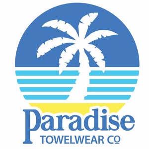 May include: A blue and yellow logo with a white palm tree and the text "Paradise Towelwear Co."