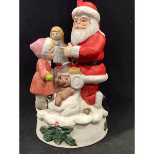 ceramic Christmas figurine , santa with child