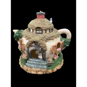 vintage teapot bird house