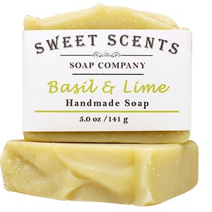 May include: A bar of handmade soap with a label that reads "Sweet Scents Soap Company Basil & Lime Handmade Soap 5.0 oz / 141 g"