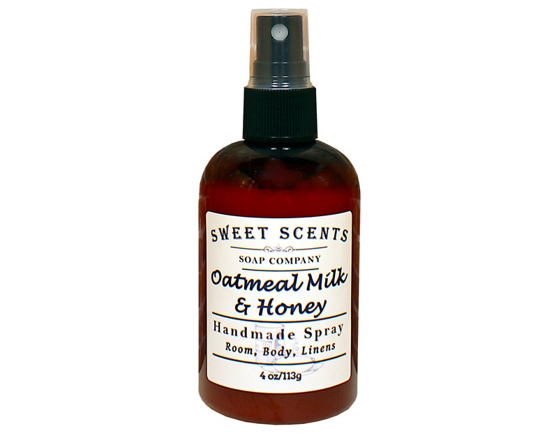 May include: A brown glass bottle with a black spray nozzle and a white label that reads "SWEET SCENTS SOAP COMPANY Oatmeal Milk & Honey Handmade Spray Room, Body, Linens 4 oz/113g"