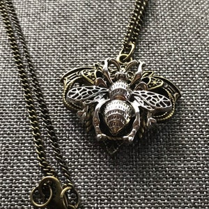 Queen bee pendant necklace