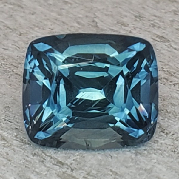 1.48 carat Montana sapphire. Teal blue gem. Perfect for high end jewelry. Beautiful rectangular cushion cut gem.