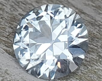 0.9 ct white Montana sapphire. Beautiful round brilliant  sapphire ready for the setting of your choosing. Amazing VS1 clarity!!!