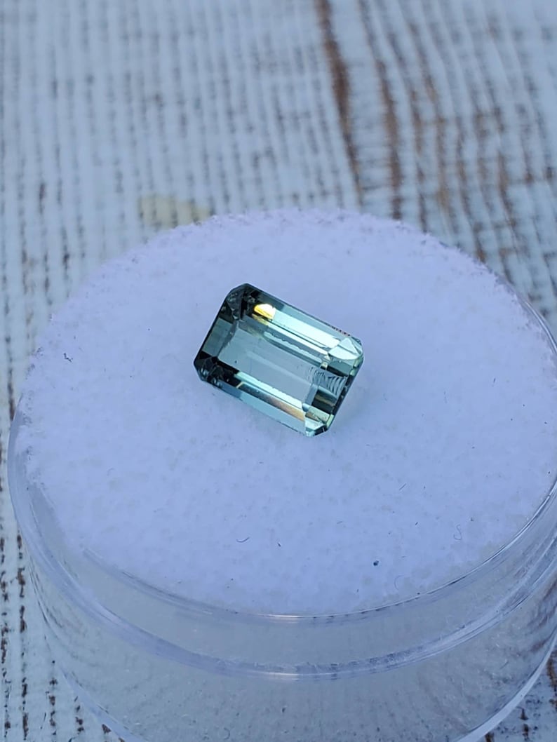 Unique gemstone 2 carats Very clean Beautiful luster Natural greenish-blue tourmaline Great for jewelry or your gem collection.