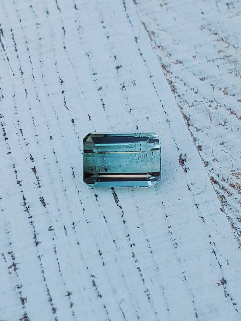 Unique gemstone 2 carats Very clean Beautiful luster Natural greenish-blue tourmaline Great for jewelry or your gem collection.