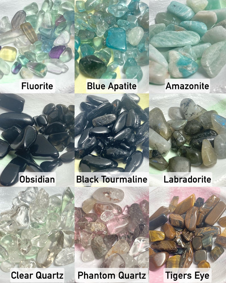 a view of our crystals: fluorite, blue apatite, amazonite, obsidian, black tourmaline, labradorite, clear quartz, phantom quartz, & tigers eye. message us for a more in depth description of each crystal.