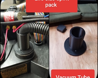 May include: A black 3D printed vacuum tube component for a life size spirit pack. The image shows the tube installed on a black device with red wires and ribbed tubing, and a separate view of the black cylindrical tube with a flat circular base.