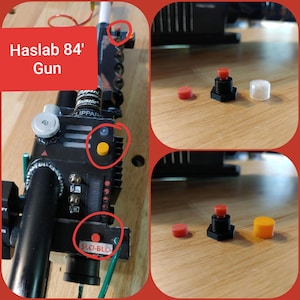 May include: A detailed image of a black and silver "Haslab 84' Gun" prop, featuring various buttons and switches. The text "SLO-BLO" is visible. Additional close-up shots show red and yellow buttons and a black component.