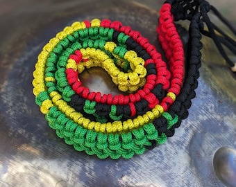 Rope braid from synthetic cord for handpan and other metal drums. Rasta design