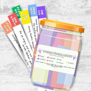 May include: A jar filled with colorful paper notes, labeled "Words From Above," with a list of feelings. Several colorful bookmarks with Bible verses are next to the jar. The jar has an orange lid.