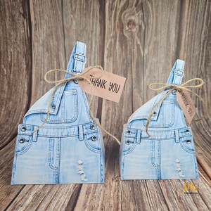 Large and small overall favor boxes side by side