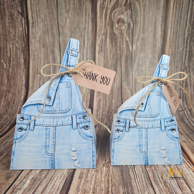 Large and small overall favor boxes side by side