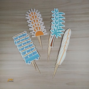 May include: Set of six cupcake toppers featuring a beach theme. The toppers include a blue and white surfboard, a blue and white van, a blue and green palm tree, and a yellow and orange sun.
