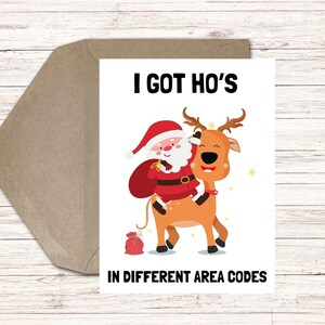 May include: A humorous Christmas card featuring a cartoon Santa Claus riding a reindeer with the text "I got ho's in different area codes".