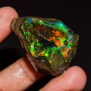 Naturlig etiopisk opal, oljeslipad, lös ädelsten 77 ct. 36X28X17 mm OE-7