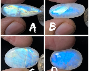 Pietra preziosa sciolta cabochon di pietra di luna arcobaleno naturale di qualità AAA + superiore per realizzare gioielli e ciondoli