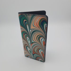 Cartera alta de piel jaspeada