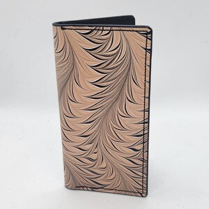 Cartera alta de piel jaspeada