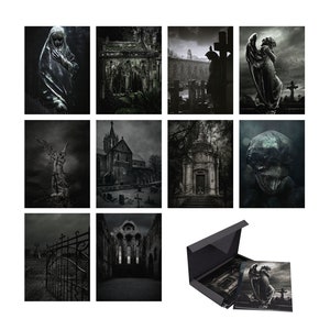 May include: A set of ten black and white gothic themed photographs featuring angels, churches, and cemeteries. The photographs are printed on high-quality paper and come in a black box.