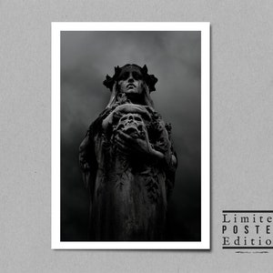 May include: Black and white photograph of a stone statue of a woman with a crown of leaves holding a skull. The statue is set against a dark, cloudy sky. The text "Limited Poster Edition" is printed in the lower right corner of the image.