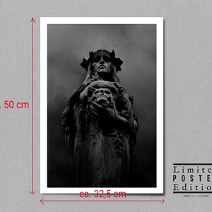 May include: Black and white photo of a stone statue of a woman holding a skull. The statue is in a cemetery and the sky is cloudy. The image is a limited edition poster.