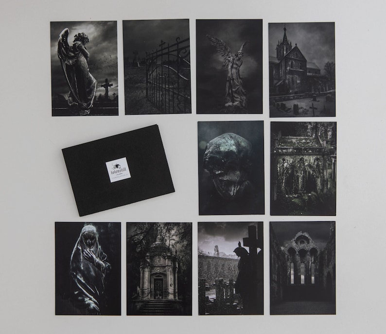 May include: A set of ten black and white photographs featuring various gothic and cemetery imagery. The images include a gate, a skull, a church, and angels.