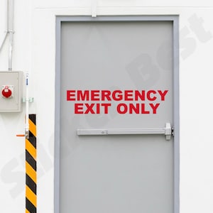 May include: A red and white sign on a gray door that reads "EMERGENCY EXIT ONLY".