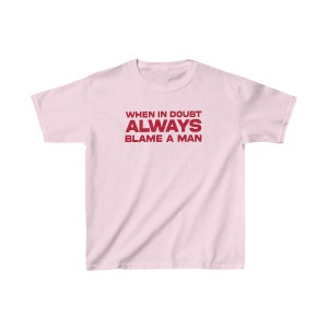 When In Doubt Always Blame A Man | Y2K Trash Graphic Shirt | Trendy 2000s Slogan Crop Top | Bold Feminist Y2K Graphic Shirt |