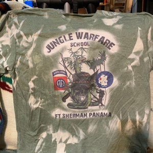 Jungle Warfare T-Shirt Ft. Sherman Panama.  With 82nd Airborne and Jungle expert patch