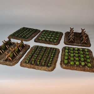 May include: A collection of miniature farm plots, each showcasing different crops. The plots are intricately detailed with green plants, brown soil, and small wooden structures. The set comprises six individual plots, ideal for tabletop games or model displays.