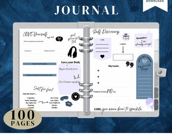 Op de afbeelding: Een grijze en witte journalhoes met de tekst "The Happiness Journal" in zwart. De hoes heeft ook een roze hart, een zwart-witte illustratie van een meisje met krullend haar en de tekst "Girl, you were born to sparkle". Het journal is ontworpen voor tieners en pre-tieners.