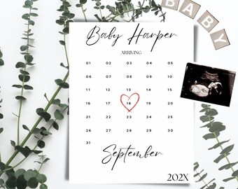 May include: A white calendar with the name "Baby Harper" written in black cursive. The calendar is for September 202X and has a red heart drawn around the 18th. An ultrasound image is in the top right corner.
