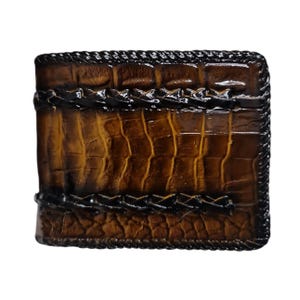 Cartera de hombre hecha a mano de piel de avestruz de color marrón oscuro con diseño de garras
