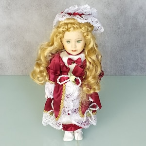 Vintage porcelain doll - Doll with cap