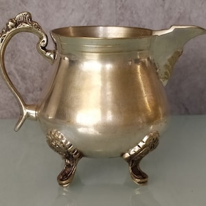 Vintage creamer pitcher Footed silvered milk jug