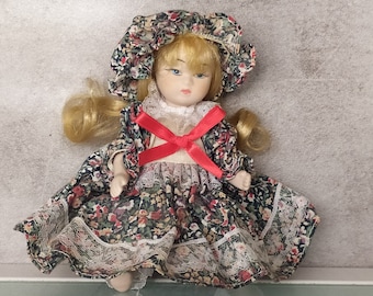 Vintage porcelain doll - Doll with cap