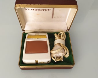 Afeitadora eléctrica Vintage Remington Mod. De Luxe roll a matic