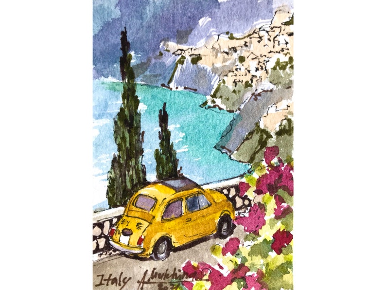 May include: A watercolor painting of a yellow Fiat car parked on a cliff overlooking a turquoise ocean. The car is facing away from the viewer, and the cliff is covered in green trees and bushes. The painting is signed "Italy" in the bottom left corner.