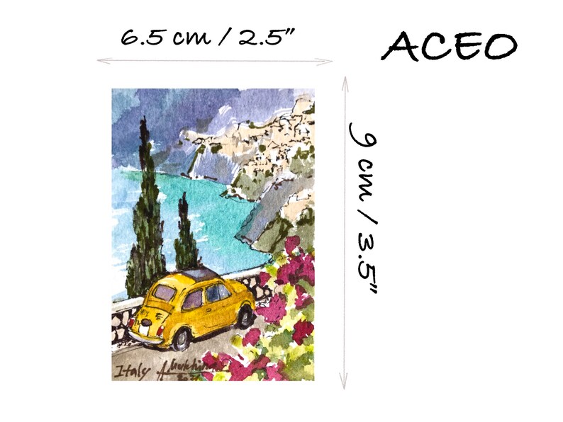 May include: A watercolor painting of a yellow Fiat car driving along a winding road overlooking a blue ocean and a white village. The painting is 9 inches by 6.5 inches and is signed "Italy" in the bottom left corner.