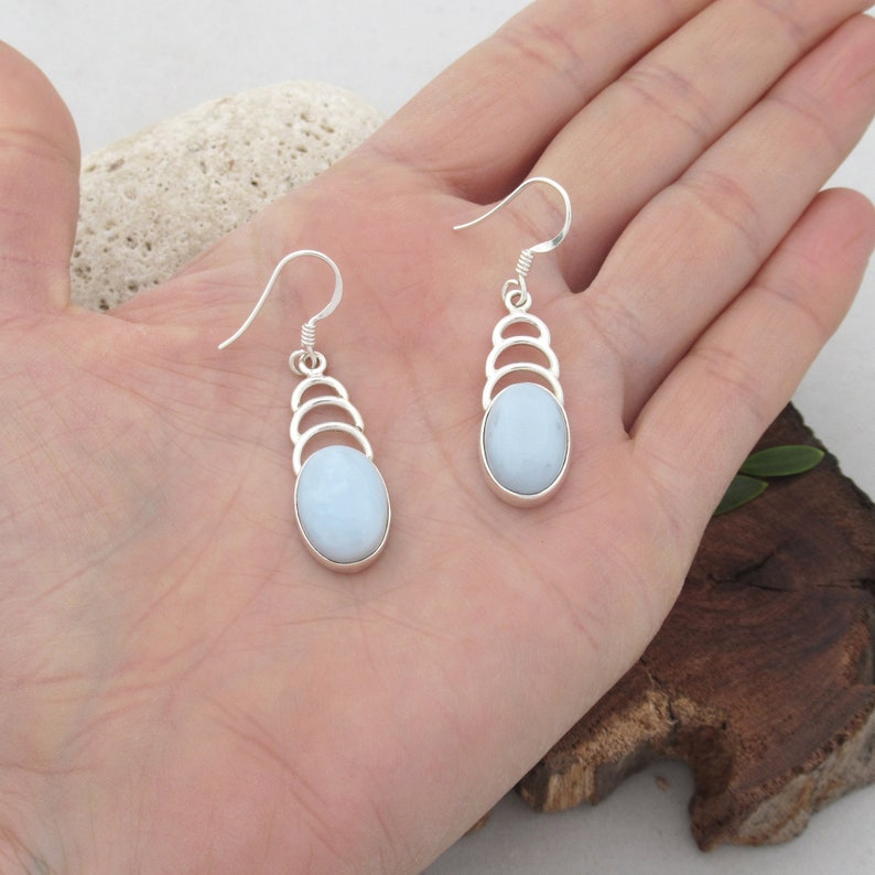 Curvy silver Blue Opal earrings Open backed stone cabochon jewelry Oval sky blue gemstone earrings throat chakra