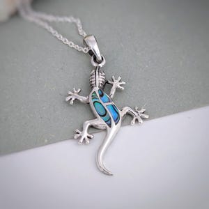 Geckohänge i sterlingsilver och abalone; Paua-snäcksödlaberlock