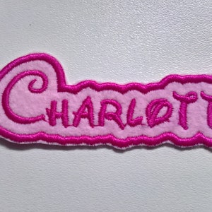 Embroidered Personalised Name Badge Patch Iron on or Sew,  Disney font,  16 colours of felt backing  Max 100mm wide