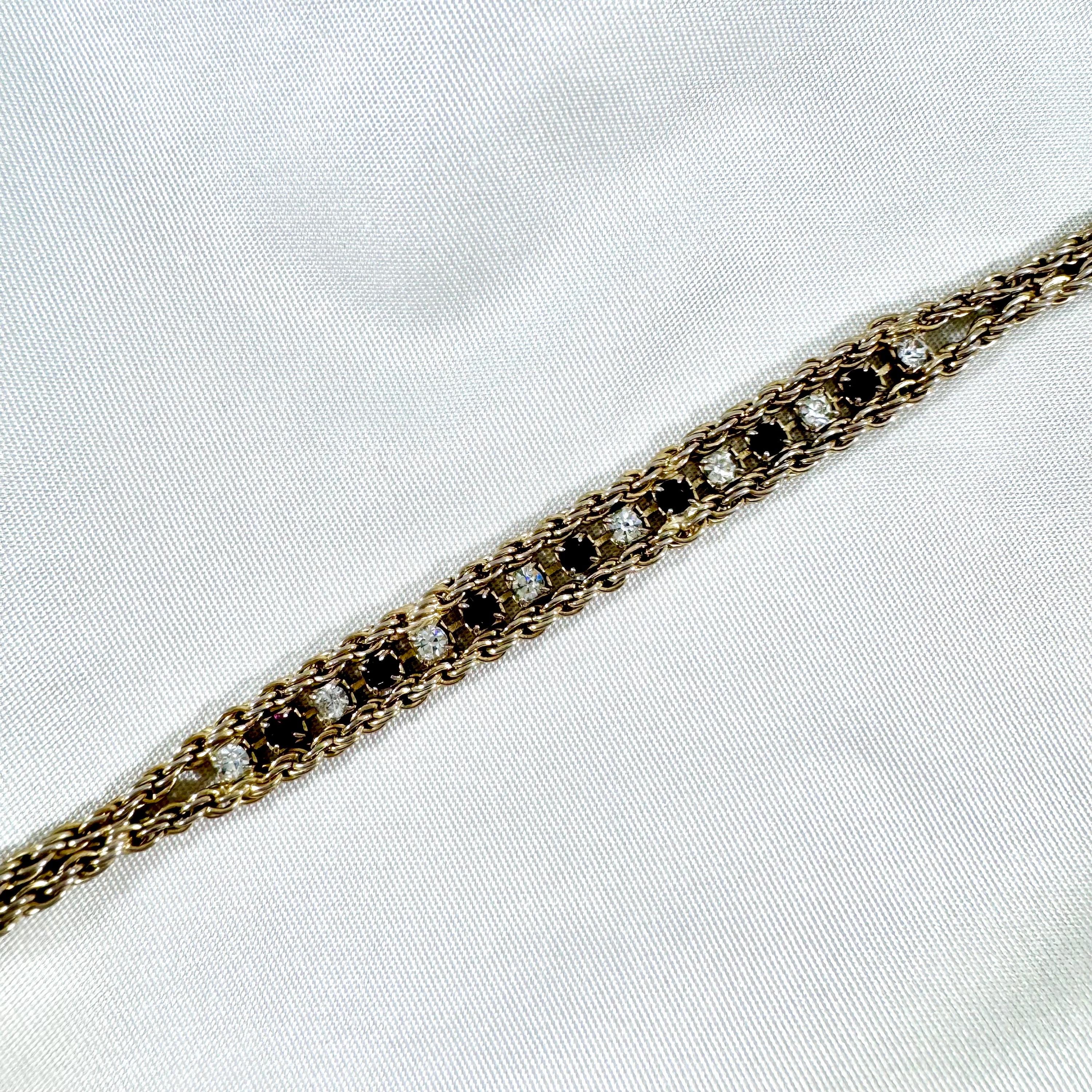 Vintage unique rope bracelet with gold tone and rhinestones design in excellent vintage condition. Vintage rope gold tone jewelry.