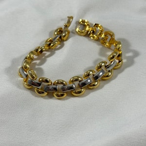 Vintage Y2K gold and silver chunky bracelet with large links. Great vintage condition! Gold and silver Y2K chunky jewelry.
