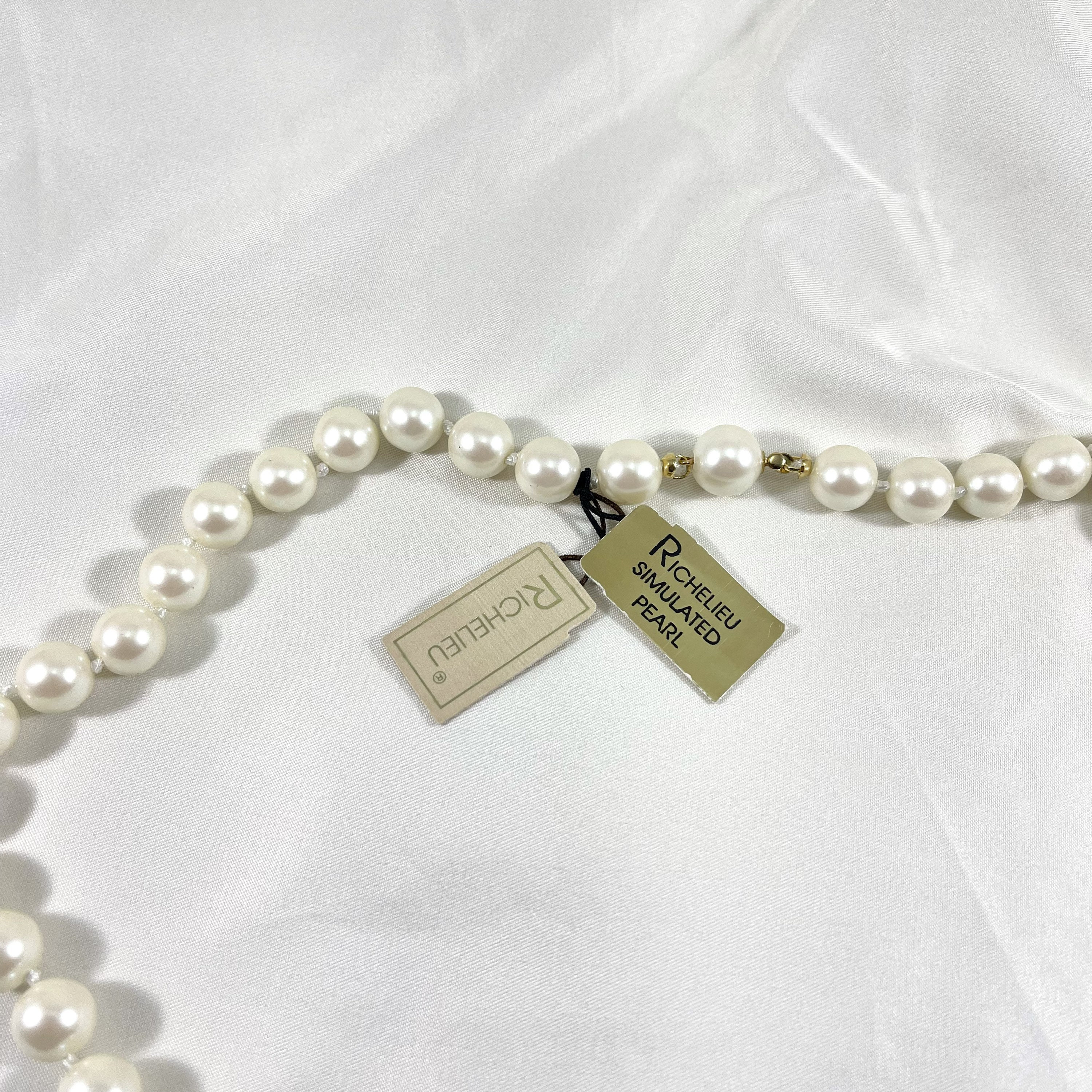Vintage Richelieu single strand faux pearl necklace | Faux pearl necklace,  Crystal ball necklace, Faux pearl