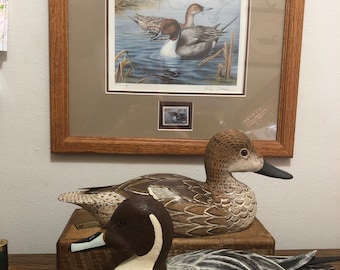 Beautiful Pintails hen and drake ducks signed by artist L Aldrich along with 1991 Duck Unlimited SD Pintails by Russ Duerksen