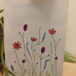 Carte en aquarelle (motif fleur)
