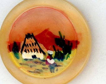 Hand painted souvenir Vegetable Ivory button mountain scene w/house, person w/package on head self shank 13/16" Dia NBS Medium great details